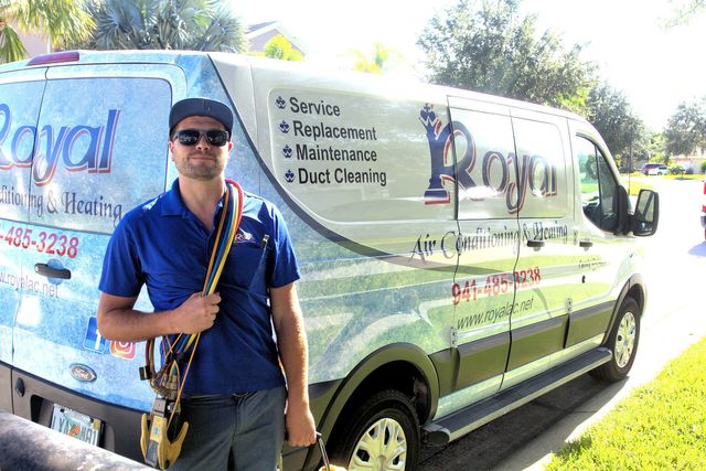 royal ac service technician ready for ac tuneup maintenance
